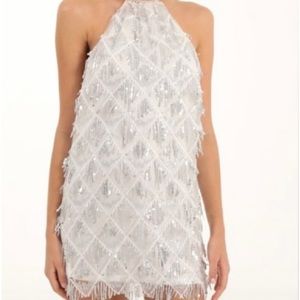 Lucy In The Sky Vesper silver sparkly revolve dress disco theme